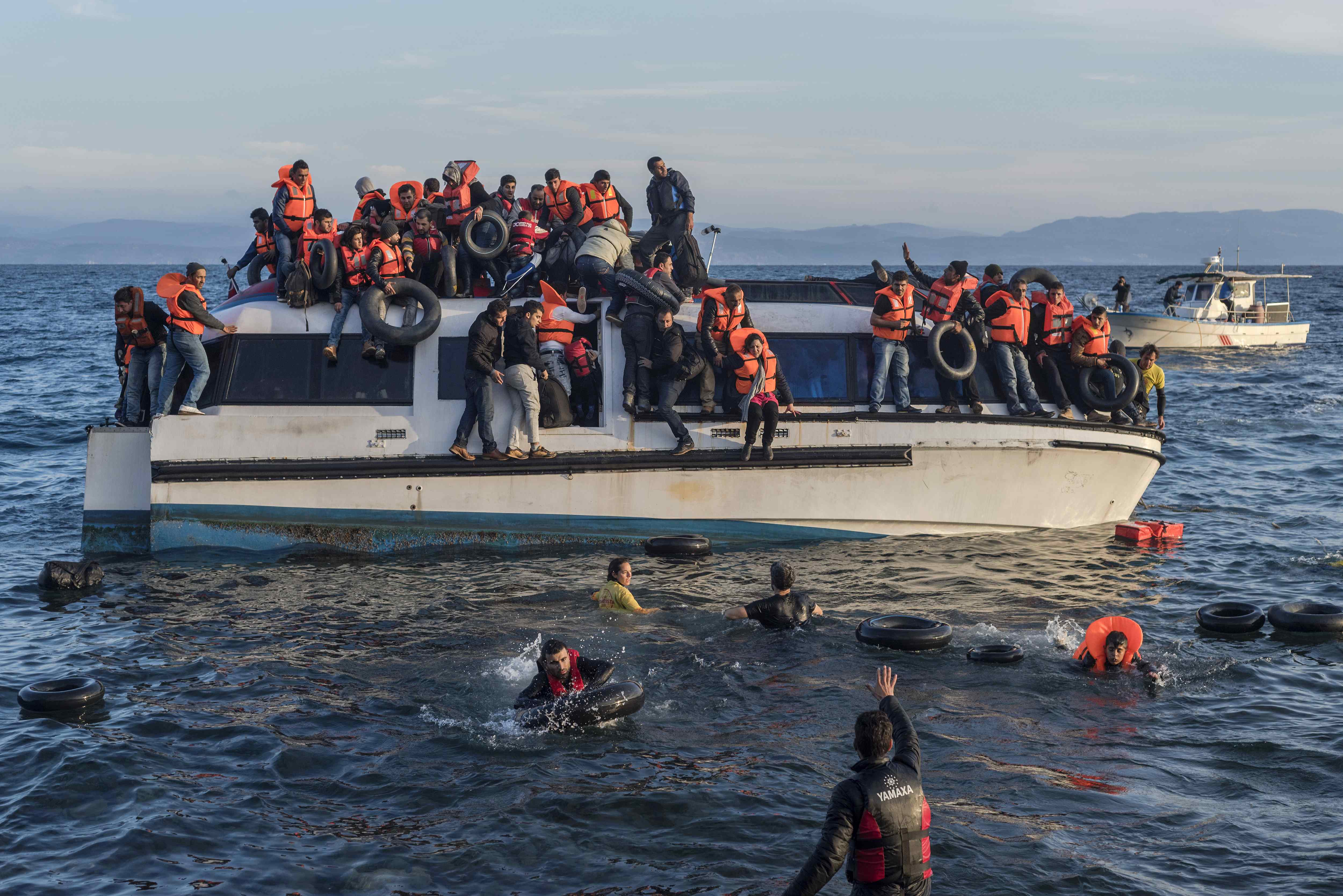 20151030 Syrians and Iraq refugees arrive at Skala Sykamias Lesvos Greece 2 1 rev